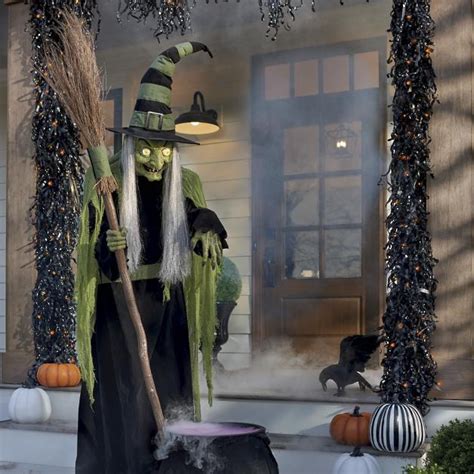 Add an element of surprise to your Halloween decorations with the Grandin Road Tapping Witch